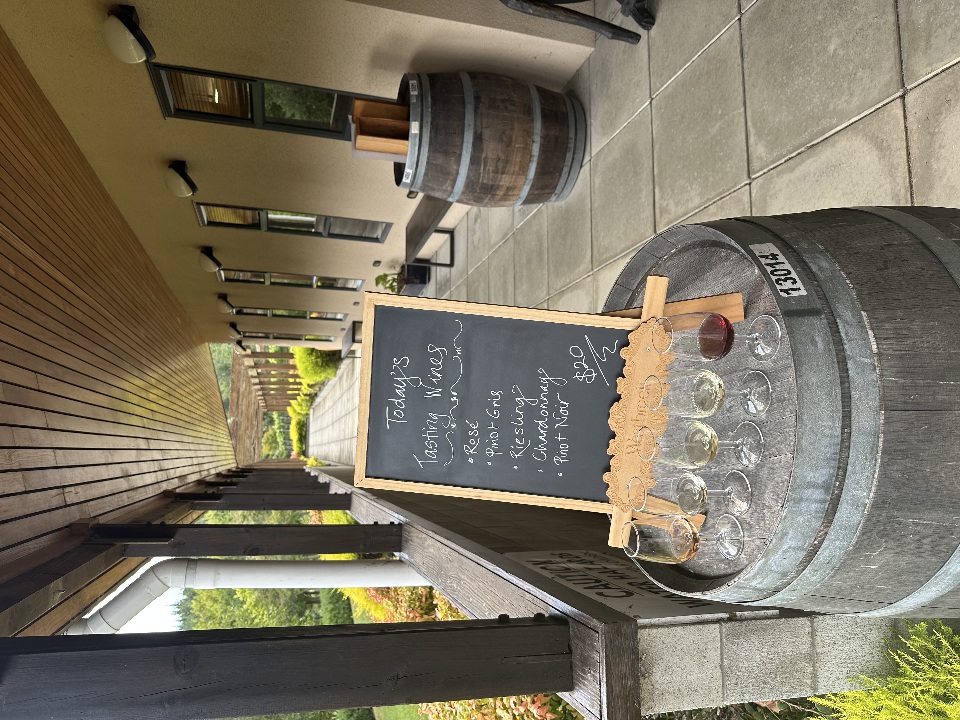 Wine tasting 5 wines and signs in walkway.jpg
